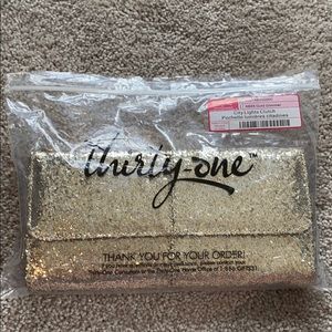 NIB Thirty One City Lights Clutch in Gold Glimmer